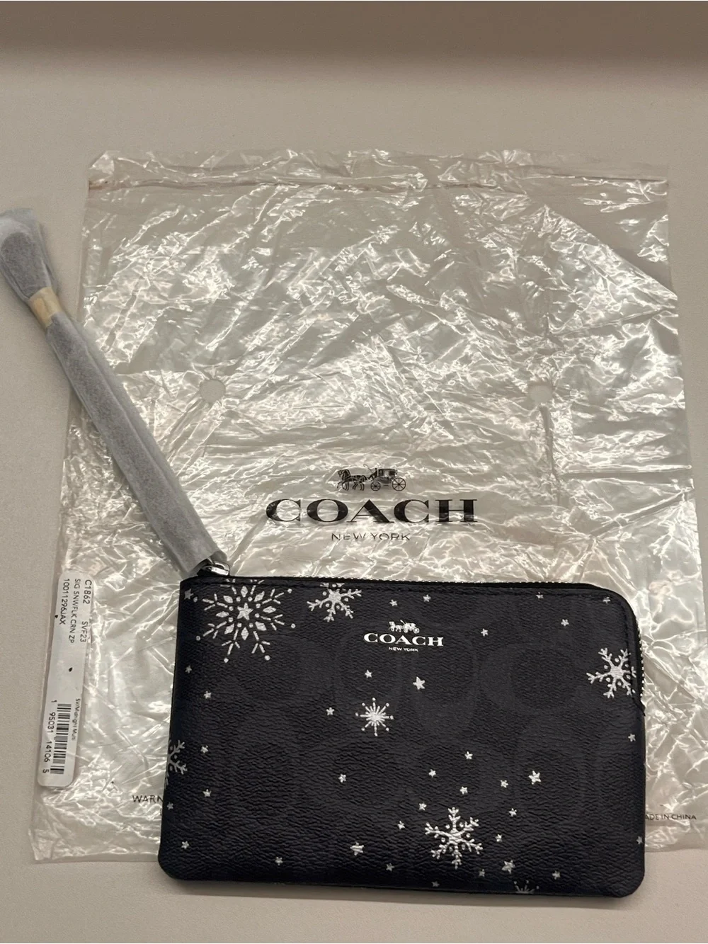 Coach Black Snowflake Zip Wristlet - Coach